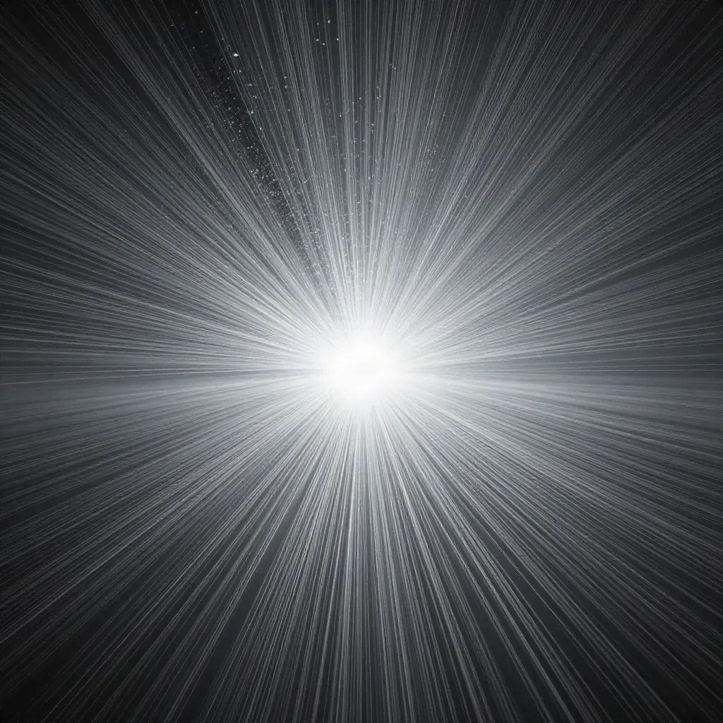 Filamenti d’argento e nebbia antracite convergono in un nucleo bianco soffuso.